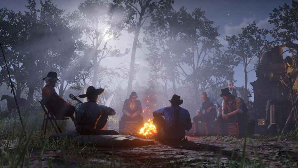 The Van Der Linde Gang sit around the fire - Red Dead Redemption 2