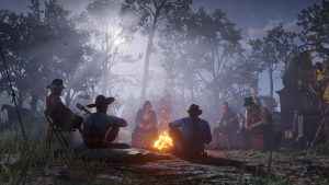 The Van Der Linde Gang sit around the fire - Red Dead Redemption 2