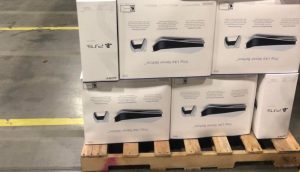 here-are-a-bunch-of-ps5s-on-a-pallet-in-a-warehouse